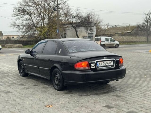 Черный Хендай Соната, объемом двигателя 2 л и пробегом 250 тыс. км за 2000 $, фото 4 на Automoto.ua