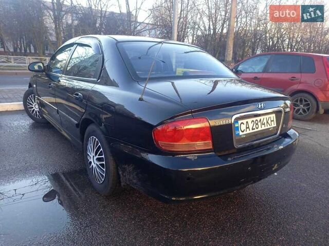Черный Хендай Соната, объемом двигателя 2 л и пробегом 381 тыс. км за 3400 $, фото 10 на Automoto.ua