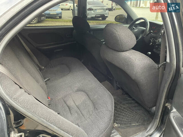 Хендай Соната 2004 в Львове на Automoto.ua Черный Хендай Соната, объемом двигателя 2 л и пробегом 220 тыс. км за 2900 $, фото 6 на Automoto.ua