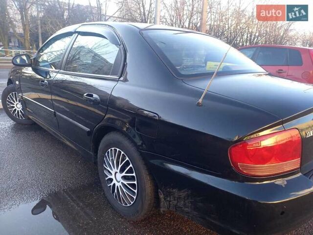 Черный Хендай Соната, объемом двигателя 2 л и пробегом 381 тыс. км за 3400 $, фото 9 на Automoto.ua