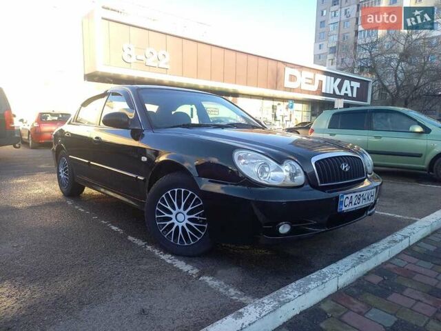 Черный Хендай Соната, объемом двигателя 2 л и пробегом 381 тыс. км за 3400 $, фото 5 на Automoto.ua