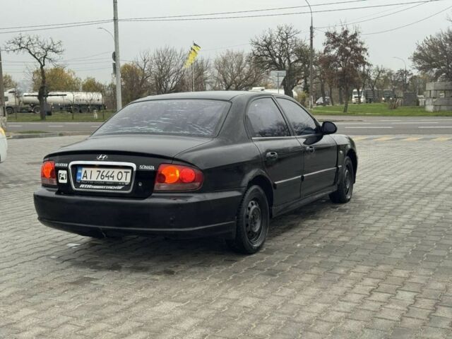 Черный Хендай Соната, объемом двигателя 2 л и пробегом 250 тыс. км за 2000 $, фото 3 на Automoto.ua