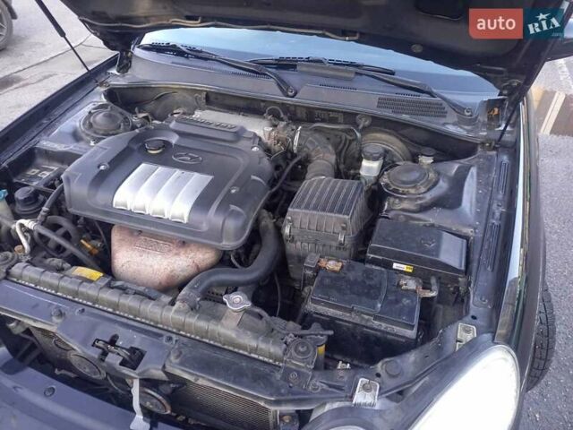 Черный Хендай Соната, объемом двигателя 2 л и пробегом 381 тыс. км за 3400 $, фото 30 на Automoto.ua