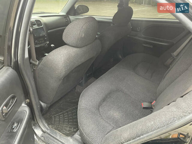 Хендай Соната 2004 в Львове на Automoto.ua Черный Хендай Соната, объемом двигателя 2 л и пробегом 220 тыс. км за 2900 $, фото 7 на Automoto.ua