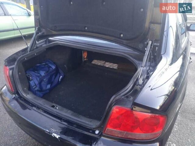 Черный Хендай Соната, объемом двигателя 2 л и пробегом 381 тыс. км за 3400 $, фото 29 на Automoto.ua