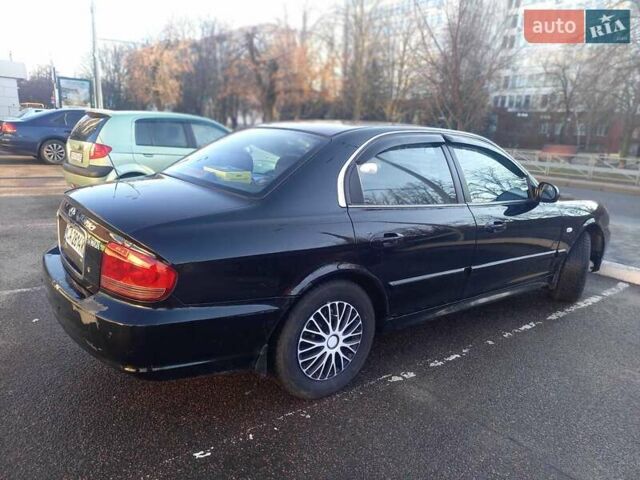 Черный Хендай Соната, объемом двигателя 2 л и пробегом 381 тыс. км за 3400 $, фото 11 на Automoto.ua