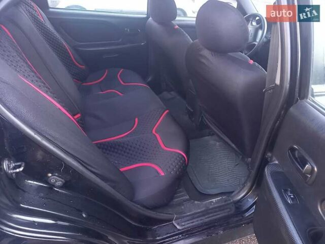 Черный Хендай Соната, объемом двигателя 2 л и пробегом 381 тыс. км за 3400 $, фото 14 на Automoto.ua