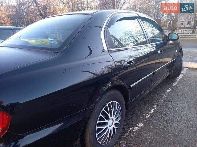 Черный Хендай Соната, объемом двигателя 2 л и пробегом 381 тыс. км за 3400 $, фото 8 на Automoto.ua