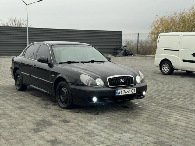Черный Хендай Соната, объемом двигателя 2 л и пробегом 250 тыс. км за 2000 $, фото 1 на Automoto.ua
