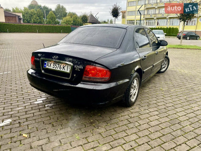 Чорний Хендай Соната, об'ємом двигуна 2 л та пробігом 300 тис. км за 3199 $, фото 9 на Automoto.ua