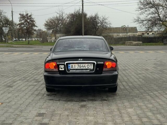 Черный Хендай Соната, объемом двигателя 2 л и пробегом 250 тыс. км за 2000 $, фото 5 на Automoto.ua