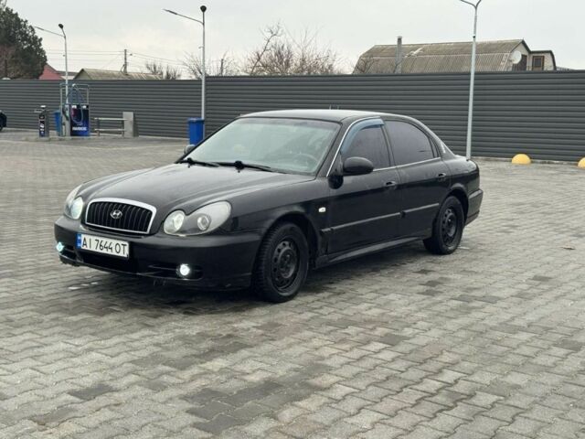 Черный Хендай Соната, объемом двигателя 2 л и пробегом 250 тыс. км за 2000 $, фото 2 на Automoto.ua