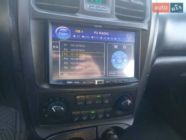 Черный Хендай Соната, объемом двигателя 2 л и пробегом 381 тыс. км за 3400 $, фото 28 на Automoto.ua