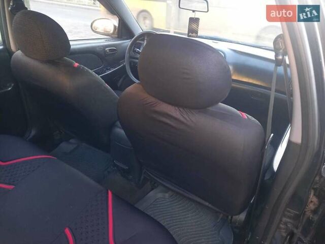 Черный Хендай Соната, объемом двигателя 2 л и пробегом 381 тыс. км за 3400 $, фото 16 на Automoto.ua