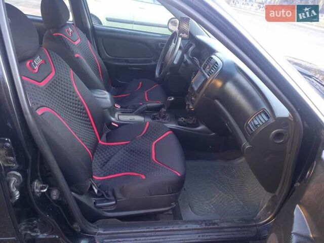 Черный Хендай Соната, объемом двигателя 2 л и пробегом 381 тыс. км за 3400 $, фото 19 на Automoto.ua