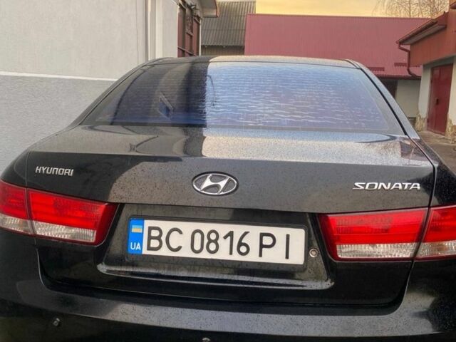 Чорний Хендай Соната, об'ємом двигуна 2.4 л та пробігом 260 тис. км за 4400 $, фото 1 на Automoto.ua