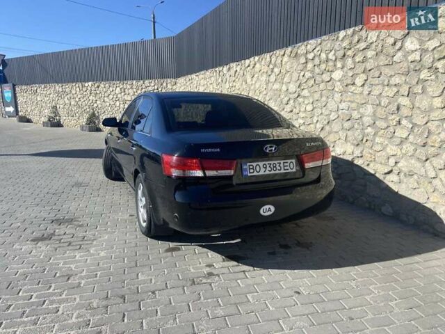 Черный Хендай Соната, объемом двигателя 2.4 л и пробегом 300 тыс. км за 5000 $, фото 5 на Automoto.ua