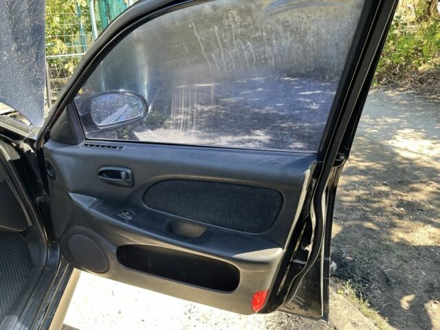 Черный Хендай Соната, объемом двигателя 2 л и пробегом 270 тыс. км за 1194 $, фото 3 на Automoto.ua