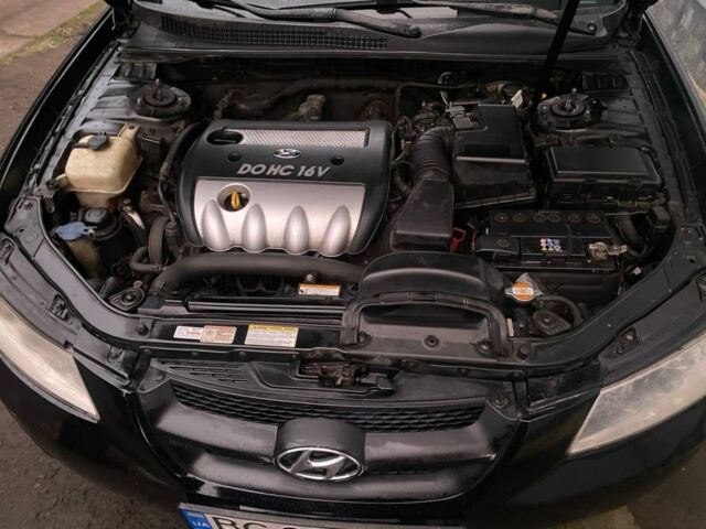 Чорний Хендай Соната, об'ємом двигуна 2.4 л та пробігом 260 тис. км за 4400 $, фото 7 на Automoto.ua