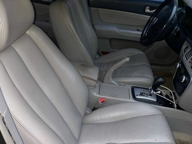 Чорний Хендай Соната, об'ємом двигуна 2.4 л та пробігом 260 тис. км за 4400 $, фото 4 на Automoto.ua