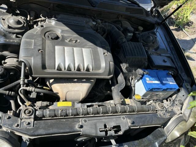 Черный Хендай Соната, объемом двигателя 2 л и пробегом 270 тыс. км за 1194 $, фото 4 на Automoto.ua