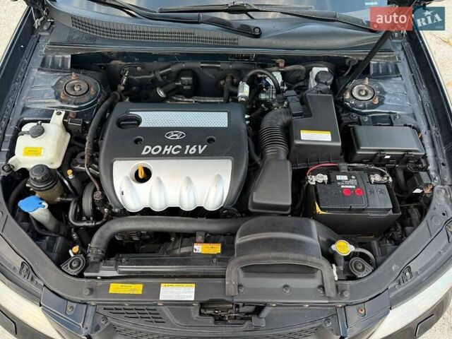 Чорний Хендай Соната, об'ємом двигуна 2.4 л та пробігом 217 тис. км за 5400 $, фото 22 на Automoto.ua