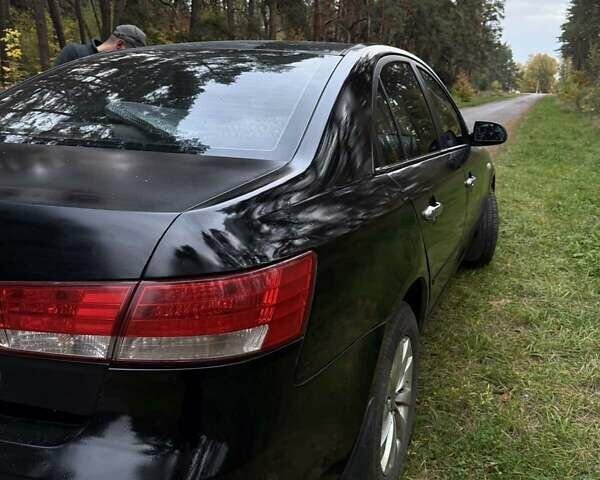 Черный Хендай Соната, объемом двигателя 2 л и пробегом 266 тыс. км за 6000 $, фото 10 на Automoto.ua