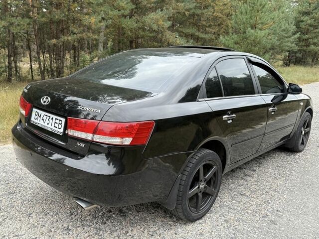 Чорний Хендай Соната, об'ємом двигуна 3.3 л та пробігом 228 тис. км за 5950 $, фото 10 на Automoto.ua