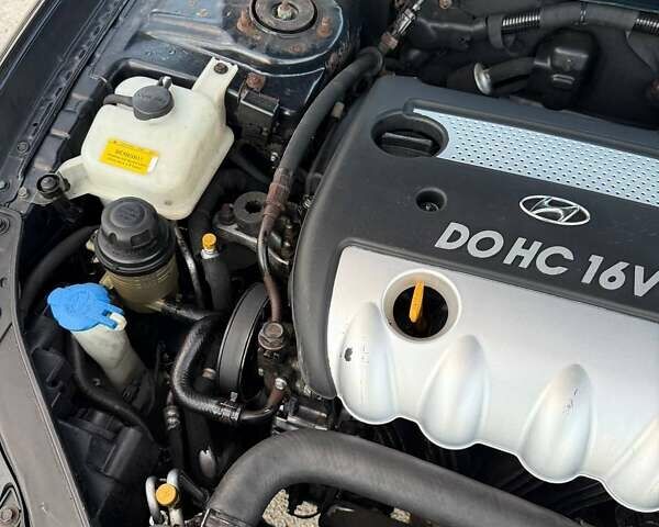 Чорний Хендай Соната, об'ємом двигуна 2.4 л та пробігом 217 тис. км за 5400 $, фото 23 на Automoto.ua