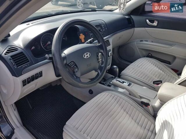 Хендай Соната 2006 у Ужгороді на Automoto.ua Чорний Хендай Соната, об'ємом двигуна 2.4 л та пробігом 290 тис. км за 7400 $, фото 17 на Automoto.ua