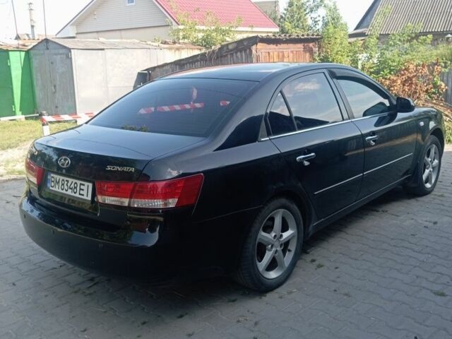 Черный Хендай Соната, объемом двигателя 2.4 л и пробегом 111 тыс. км за 5000 $, фото 3 на Automoto.ua