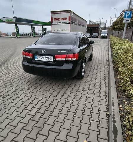Черный Хендай Соната, объемом двигателя 2 л и пробегом 172 тыс. км за 6100 $, фото 5 на Automoto.ua