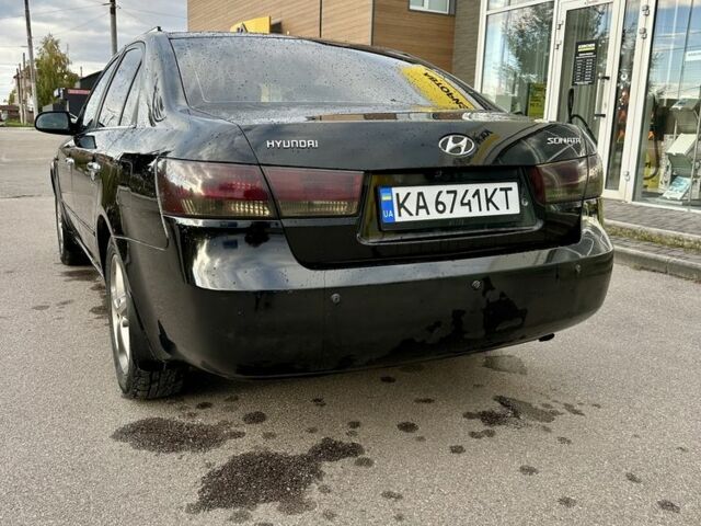 Чорний Хендай Соната, об'ємом двигуна 2.4 л та пробігом 270 тис. км за 4900 $, фото 9 на Automoto.ua