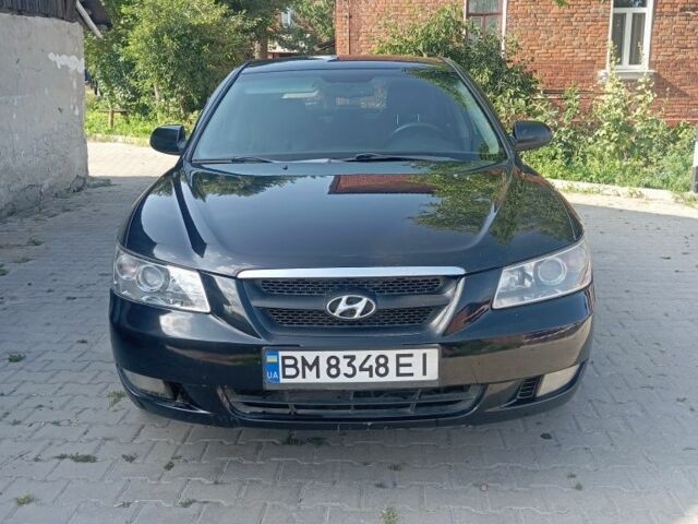 Черный Хендай Соната, объемом двигателя 2.4 л и пробегом 111 тыс. км за 5000 $, фото 2 на Automoto.ua