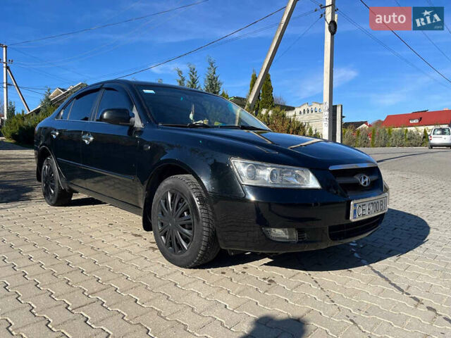 Черный Хендай Соната, объемом двигателя 2.36 л и пробегом 272 тыс. км за 5300 $, фото 2 на Automoto.ua