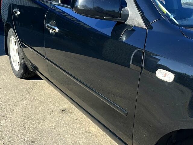 Черный Хендай Соната, объемом двигателя 2 л и пробегом 265 тыс. км за 5700 $, фото 5 на Automoto.ua