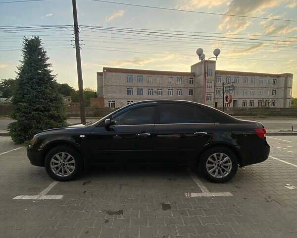 Черный Хендай Соната, объемом двигателя 2 л и пробегом 395 тыс. км за 4650 $, фото 8 на Automoto.ua