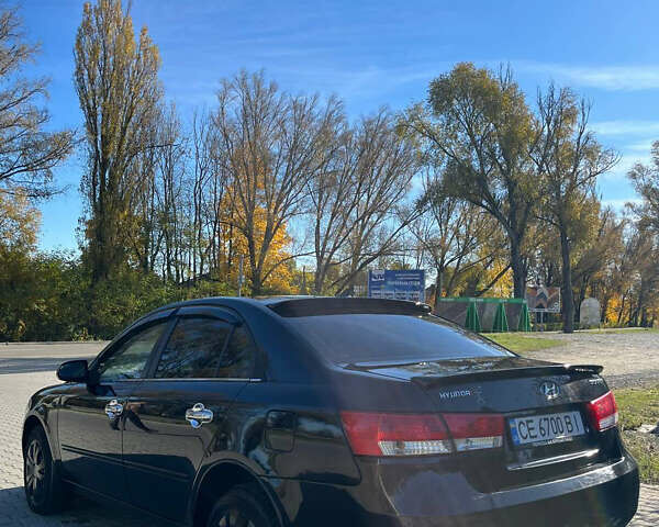 Черный Хендай Соната, объемом двигателя 2.36 л и пробегом 272 тыс. км за 5300 $, фото 6 на Automoto.ua