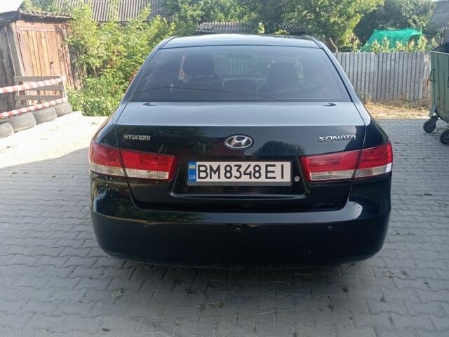 Черный Хендай Соната, объемом двигателя 2.4 л и пробегом 111 тыс. км за 5000 $, фото 5 на Automoto.ua