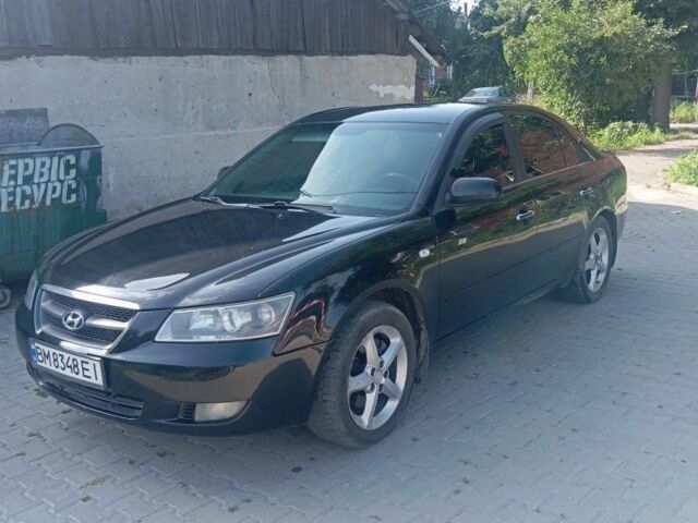 Черный Хендай Соната, объемом двигателя 2.4 л и пробегом 111 тыс. км за 5000 $, фото 1 на Automoto.ua