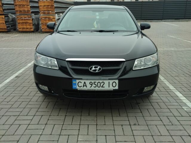 Черный Хендай Соната, объемом двигателя 2 л и пробегом 244 тыс. км за 6000 $, фото 1 на Automoto.ua