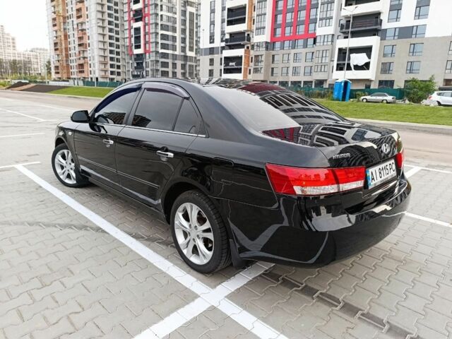 Черный Хендай Соната, объемом двигателя 2 л и пробегом 242 тыс. км за 5750 $, фото 5 на Automoto.ua