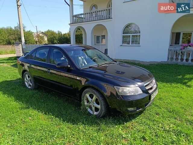 Черный Хендай Соната, объемом двигателя 2 л и пробегом 240 тыс. км за 5500 $, фото 7 на Automoto.ua