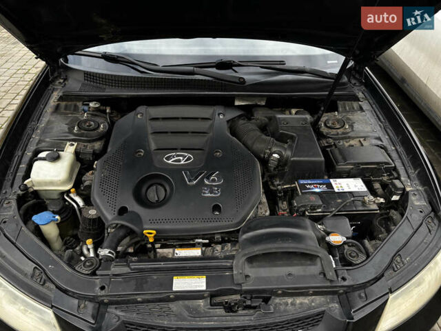 Чорний Хендай Соната, об'ємом двигуна 3.3 л та пробігом 166 тис. км за 6500 $, фото 12 на Automoto.ua