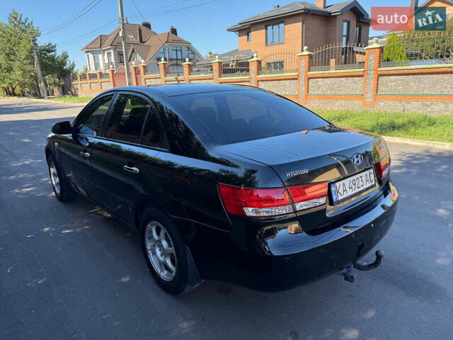 Черный Хендай Соната, объемом двигателя 2 л и пробегом 259 тыс. км за 5199 $, фото 4 на Automoto.ua