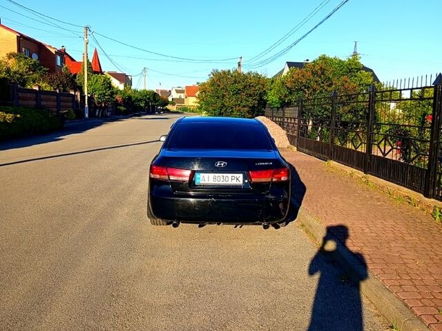 Черный Хендай Соната, объемом двигателя 2 л и пробегом 320 тыс. км за 6200 $, фото 7 на Automoto.ua