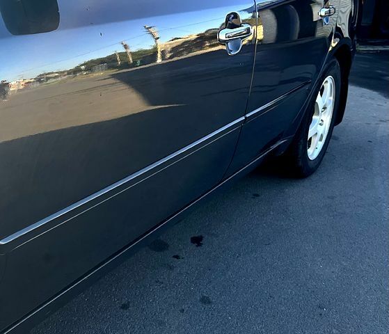 Черный Хендай Соната, объемом двигателя 2 л и пробегом 265 тыс. км за 5700 $, фото 4 на Automoto.ua