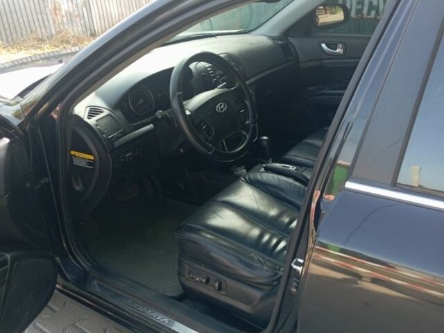 Черный Хендай Соната, объемом двигателя 2.4 л и пробегом 111 тыс. км за 5000 $, фото 6 на Automoto.ua