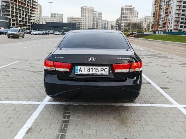 Черный Хендай Соната, объемом двигателя 2 л и пробегом 242 тыс. км за 5750 $, фото 3 на Automoto.ua