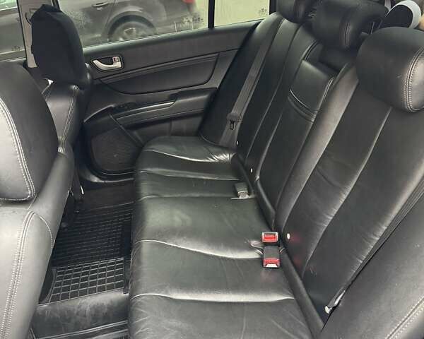 Черный Хендай Соната, объемом двигателя 2.4 л и пробегом 214 тыс. км за 7000 $, фото 2 на Automoto.ua